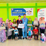 Alfamidi Rampungkan CSR Tahap 6, Distribusikan 9.000 Telur di Kabupaten Buru